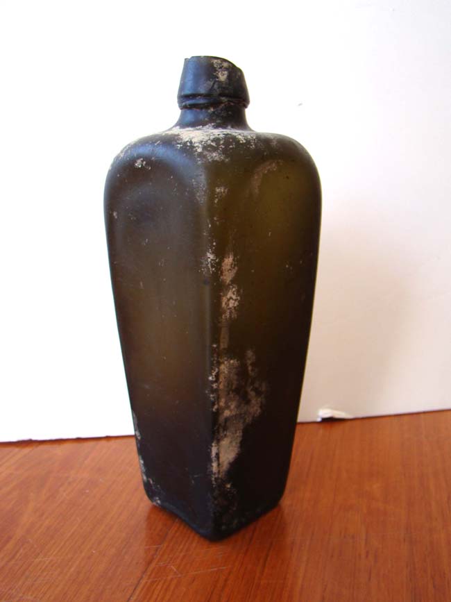 An 18th century Dutch Square Case Gin Bottle salvaged from a river bed in Virginia